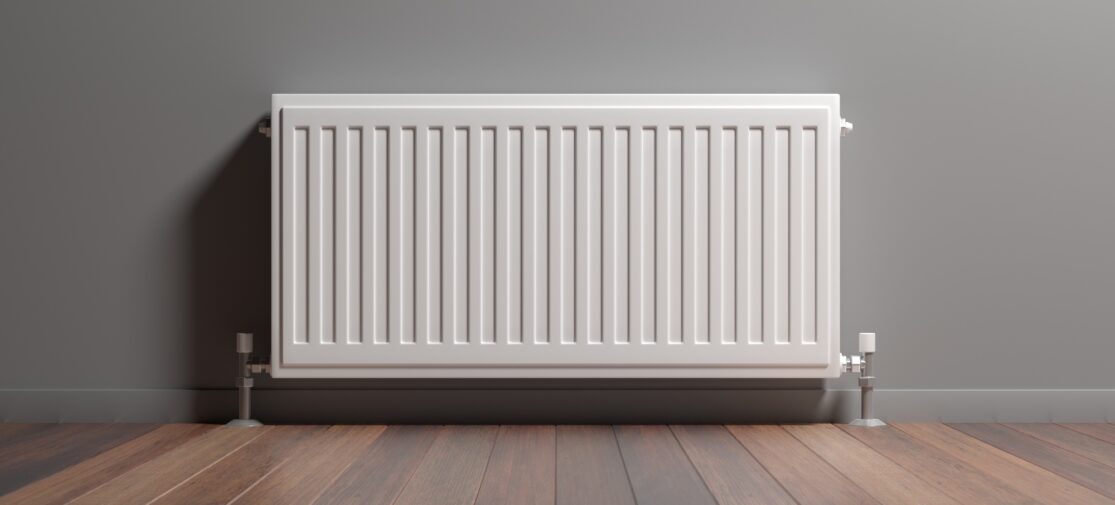 Grzejnik, drewniana podłoga, szara ściana w tle, ilustracja 3D